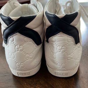 Gucci White High Top Tennis Shoes Lace Up. Men’s Size 7. Women’s size 8.5.